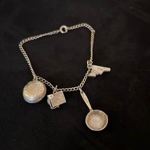 Antique sterling silver mechanical charm bracelet & charms